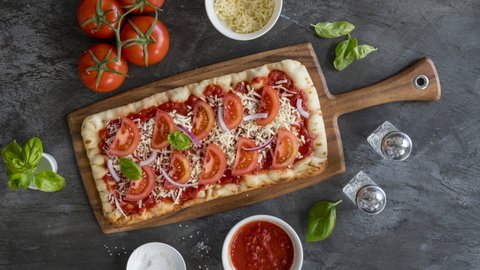Stop Motion Animation of Building a Tomato and Basil Flatbread Pizza