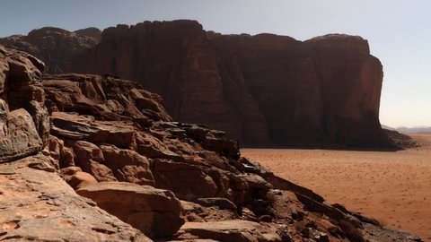 Detail of red granite rocks in the famous tourist place of Wadi Rum desert in Jordan also know as Valley of the Moon and used as many film set