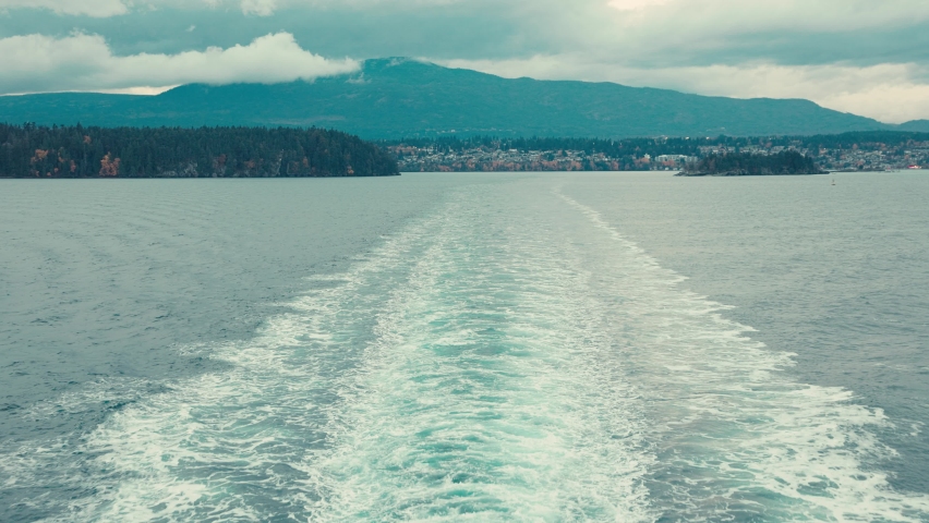 Looking off the back of a Ferry as it leaves the harbor