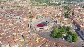 Inscription on video. Verona, Italy. Flying over the historic city center. Arena di Verona, summer. Heat burns text, Aerial View, Point of interest