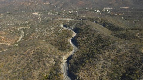 Windy Road Through Hills of Baja California Sur, Mexico. Aerial View
