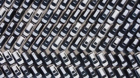 Market of new cars in Vladivostok. Customs cleared cars in the port. View from above. New cars.