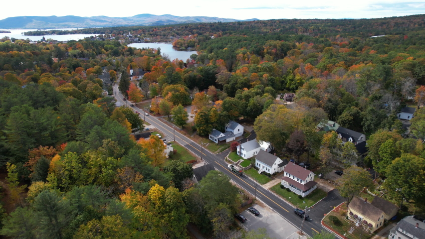 Wolfeboro, New Hampshire USA. Aerial View of Colorful Landscape and Traffic in American Countryside, Lakeside Homes and Tree Colors