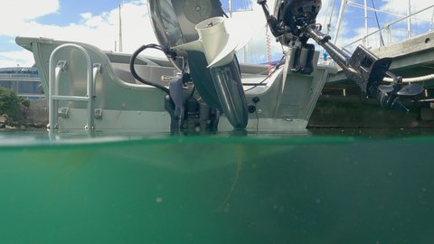 50 50 Over Underwater Pan of Boat Hull with Outboard Engines, Dublin, Ireland