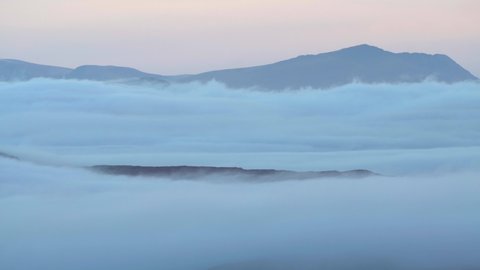 Cloud inversion background mountain timelapse of Snowdonia at dawn