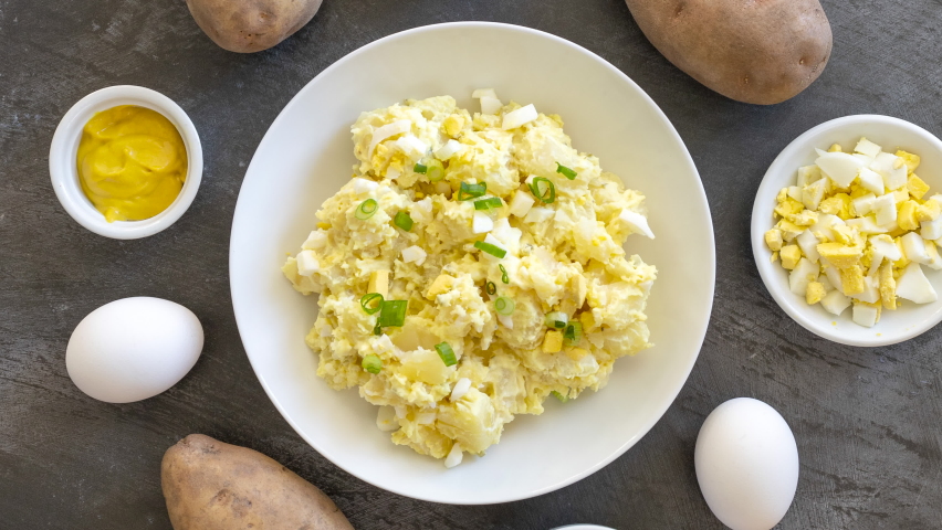Rotating Bowl of American Potato Salad with Egg and Mustard Royalty-Free Stock Footage #1088088515