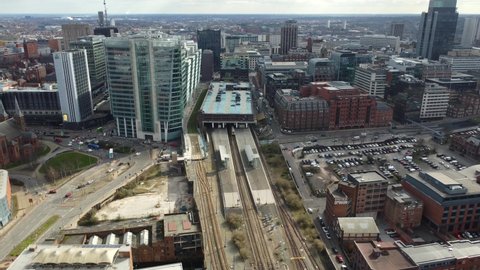 BIRMINGHAM, UK - 2022: Aerial reveal of Birmingham City Centre with BT building and railway station