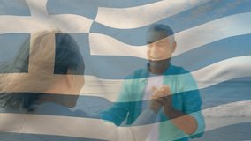 Animation of flag of greece over happy senior caucasian couple dancing on beach. senior lifestyle, retirement and holiday concept digitally generated video. - Powered by Shutterstock - Get 15% off with code: PIKWIZARD15