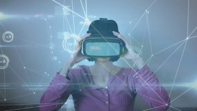 Animation of network of connections over caucasian woman wearing vr headset. connections, technology and data processing concept digitally generated video. - Powered by Shutterstock - Get 15% off with code: PIKWIZARD15