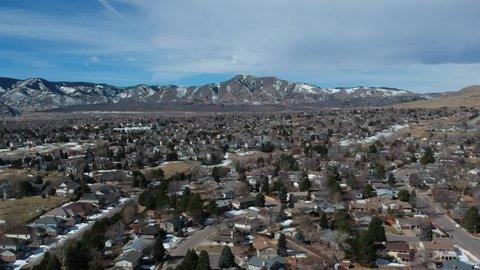 A slow drone pan over a Denver Colorado suburb