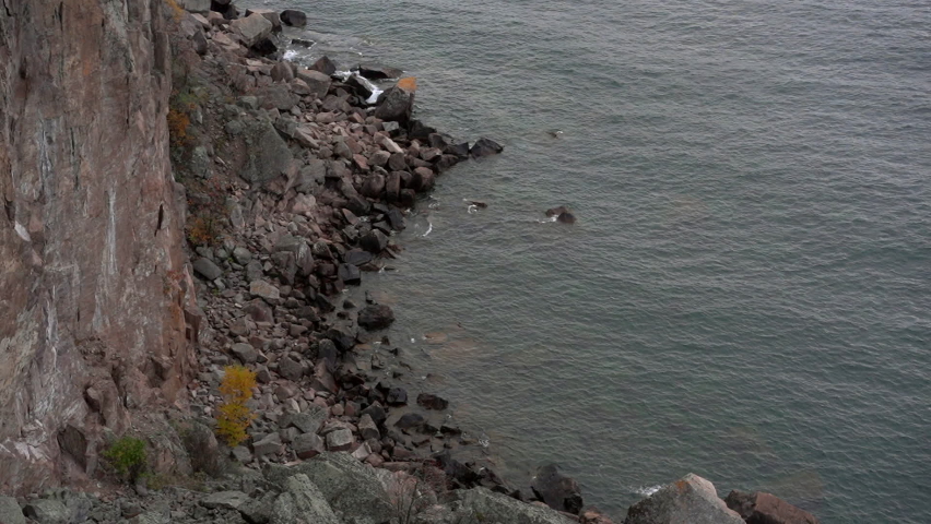 Rock cliffs along lake shore 