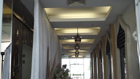 The chandeliers that line the corridors of the building certainly make the decoration more beautiful
