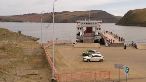 Summer 2021. Irkutsk region, Russia | Ferry service from the mainland to the island. 