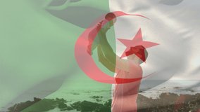 Animation of flag of algeria over caucasian man with baby at beach. patriotism and celebration concept digitally generated video.