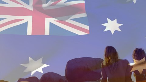 Animation of flag of australia over diverse group of friends at beach. patriotism and celebration concept digitally generated video.