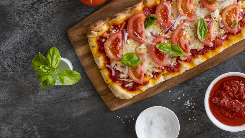 Panning over a Flatbread Pizza Royalty-Free Stock Footage #1088116117