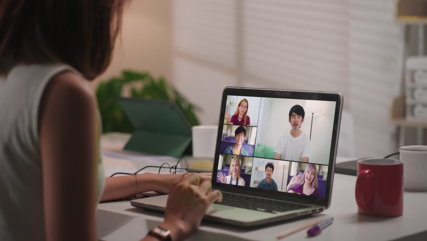 Diverse group of colleagues working from home having a video conference call together. Royalty-Free Stock Footage #1088117749