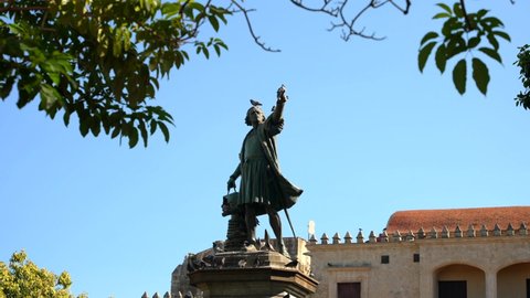 Dominican Republic, Santo Domingo - January 28, 2022: Close-up of a monument to Christopher Columbus against the blue sky. Tourist area in the Colonial City