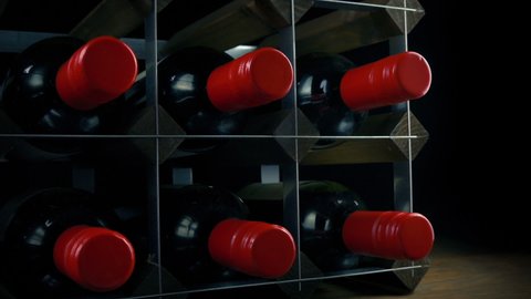 Wine Rack With Many Bottles Moving Shot