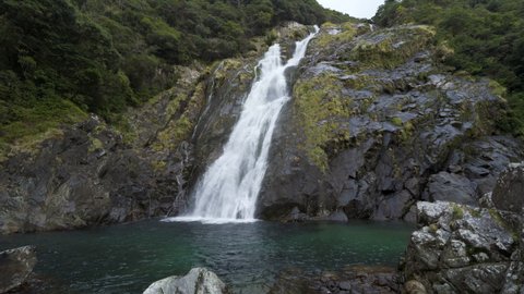 Cinematic shot of ohko no taki waterfall in Yakushima, Japan