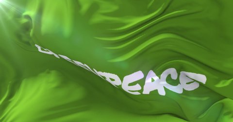 Velez Malaga, Malaga Spain - 09 24 2017: Greenpeace flag waving at wind, loop