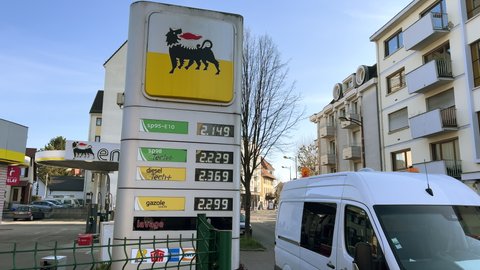 Strasbourg, France - Mar 11 2022: Italian Eni gas station with new prices at the pump exceeding all expectations. The war in Ukraine has pushed fuel prices above the two-euro threshold for first time.
