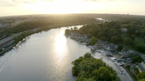 Beautiful Drone Shot of the Famous Boathouse Row in Philadelphia and the Schuylkill River During Golden Hour with the Sunset in the Background