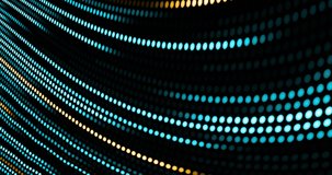 Animation of blue and yellow dotted light trails moving in hypnotic motion on seamless loop. light, colour and movement concept digitally generated video.