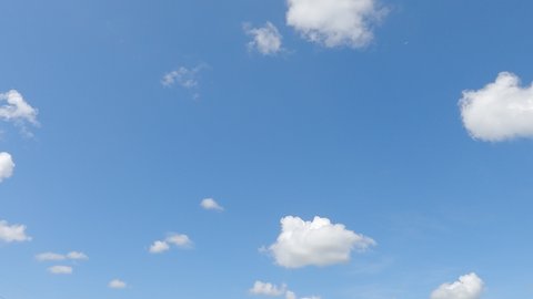 White heart shaped cloud n fluffy cumulus cloudscape on beautiful sunny clear blue sky background in tropical summer or spring sunlight at sunshine day, Fast motion 4k cinemagraph b-roll TimeLapse
