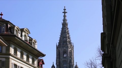 Bern cityscape with tower of Bern Minster, reformed church in old city of Bern, Switzerland.