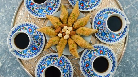Turkish coffee and baklava on the table. Selective focus.