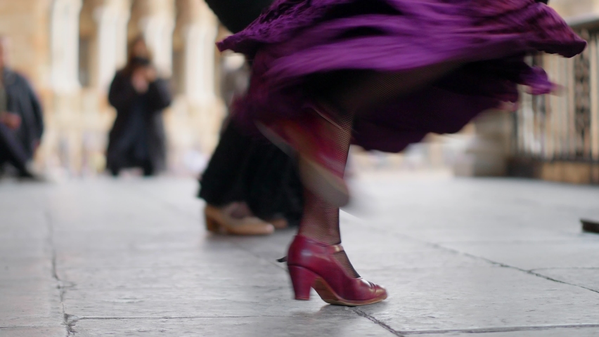 Flamenco dancer in the street, female flamenco artists dancing in Seville, feet of street flamenco dancers in Andalusia, Spain. High quality 4k footage | Shutterstock HD Video #1088165149