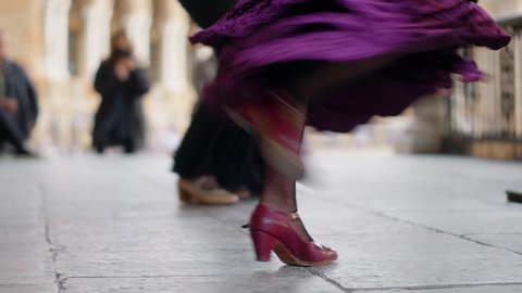 flamenco dancer in the street, female flamenco artists dancing in Seville, feet of street flamenco dancers in Andalusia, Spain. High quality 4k footage