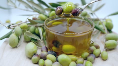 Widespread using of organic olive oil in beauty industry, natural olive oil with antioxidant benefits for human skin care. Olive oil smoothing wrinkles and rejuvenating appearance