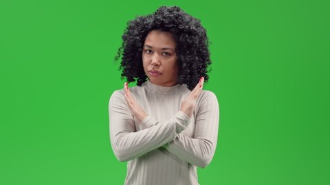 american woman showing crossed arms domestic violence, racism racial discrimination Isolated on Green Screen