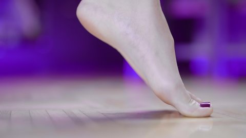 Female foot arch step on toes show healthy arch 4K
