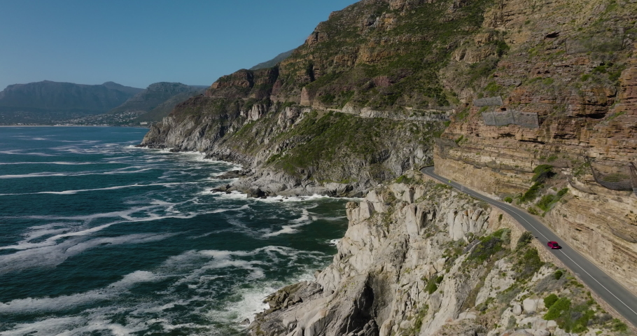Spectacular Aerial view from the scenic Chapman's Peak Drive looking at Hout Bay,Cape Town, South Africa Royalty-Free Stock Footage #1088184339