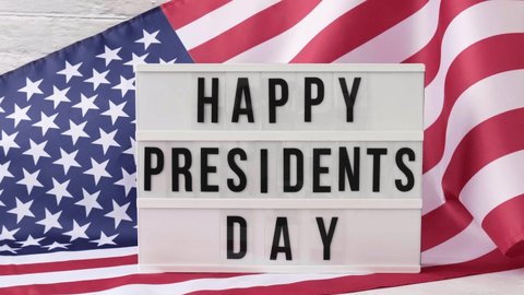 4k Waving American Flag Background Lightbox with text HAPPY PRESIDENTS DAY Flag of the united states of America. July 4th Independence Day. USA patriotism national holiday. Usa proud.