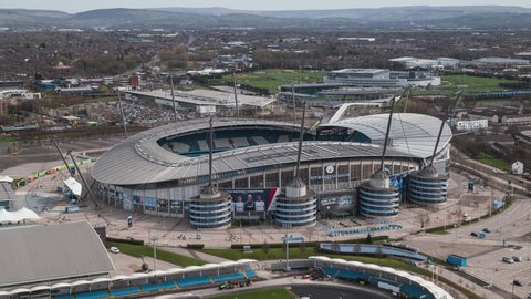 Manchester, Great Britain - circa 2022 - Establishing Aerial View Shot of Manchester UK, England United Kingdom Etihad Stadium City FC