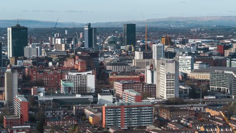 Establishing Aerial View Shot of Manchester UK, England United Kingdom, day city center traffic