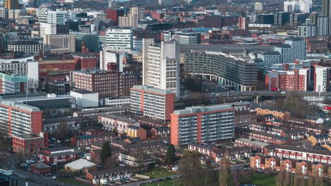 Establishing Aerial View Shot of Manchester UK, England United Kingdom, busy roads of the city