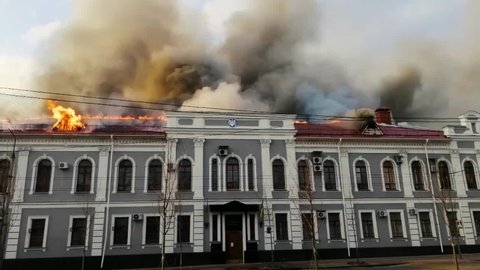 Kiev, Ukraine - 03.08.2022: Burning building in Ukraine after the bomb attack.