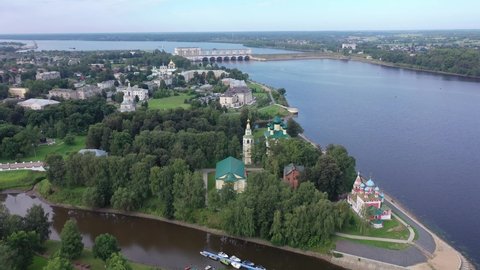 Picturesque aerial view of modern townscape of Uglich overlooking dam on Volga River on summer day, Yaroslavl region, Russia. High quality 4k footage