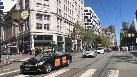 San Francisco, CA - March 12, 2022: 4K HD video of Senator Scott Wiener, City Attorney David Chiu and Supervisor Catherine Stefani in cars in the 2022 Saint Patrick's Day Parade
