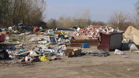 Driving by Fly Tipping Illegal Dumping Site in City Environment Problem