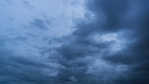 Time lapse, dark storm clouds with background,Dark clouds before a thunder-storm.
