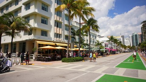 Miami Beach, FL, USA - March 12, 2022: World famous Miami Beach Ocean Drive Spring Break 2022 4k 60fps