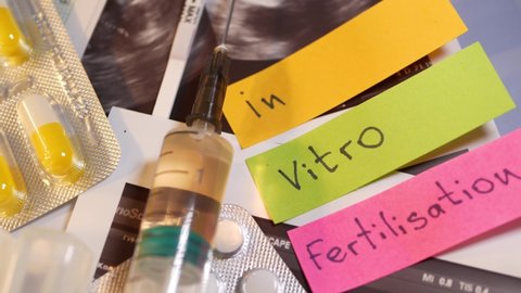 IVF or in vitro fertilisation, reproductive assisted technology, infertility or sterility treatment. Ultrasound or ultrasonography, pregnancy test, syringe and pills. Hormonal drugs for stimulation.