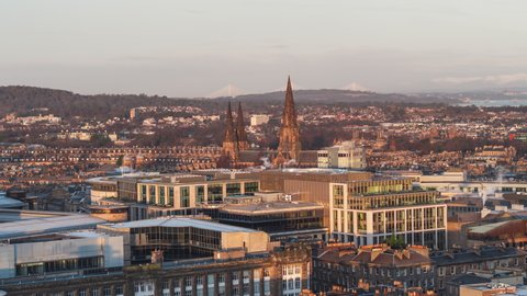 Establishing Aerial View Shot of Edinburgh UK, Scotland United Kingdom, cityscape in gold