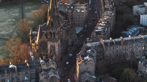 Establishing Aerial View Shot of Edinburgh UK, Scotland United Kingdom, traffic in narrow streets